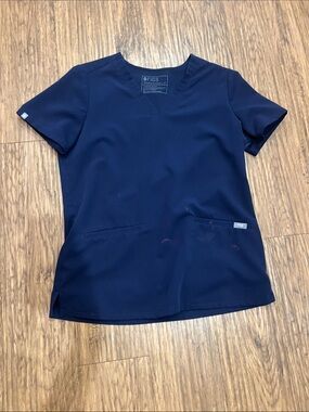 FIGS Navy Short-Sleeve V-Neck Scrub Top
Size: S
Has bleach stains